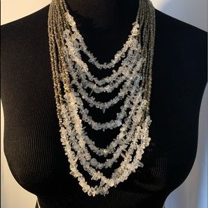 Chico’s “Icy” Waterfall Necklace. 9 tier Gray seed and, clear rock like beads.